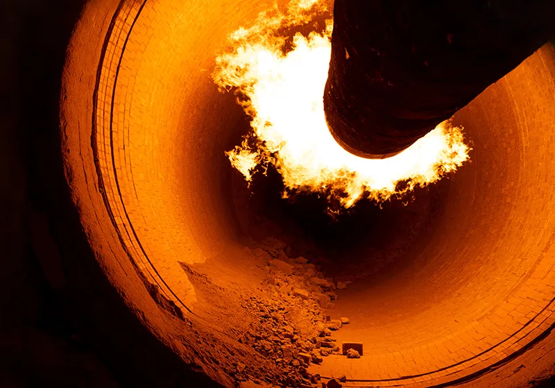 flame in rotary kiln during heating mode in cement plant